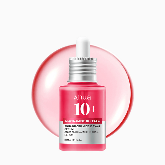 Frasco del serum Anua Niacinamide 10 + TXA 4 color rosado con tapa plateada, sobre fondo blanco con gota del producto detrás, estilo limpio y minimalista.