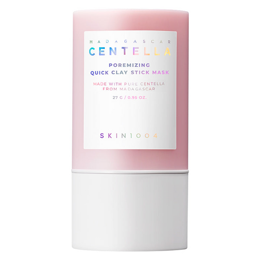 Envase del producto Skin1004 Madagascar Centella Poremizing Quick Clay Stick Mask de 27 g, en barra color rosa y blanco, fotografiado sobre fondo blanco limpio.
